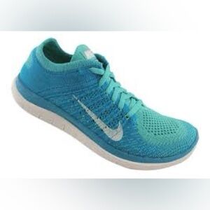 Nike Women's Free 4.0 Flyknit running shoes in a turquoise blue size 7